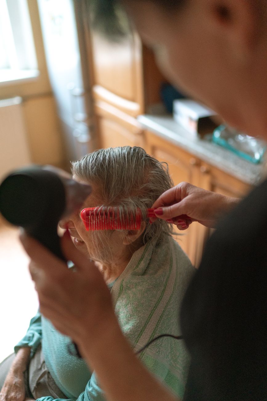 Caregiver and client, at home